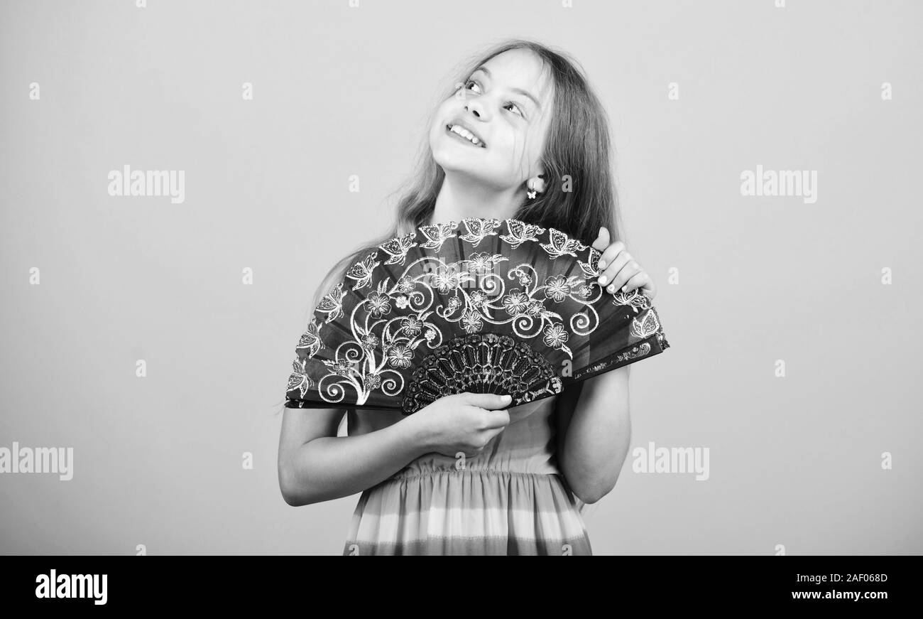 Acting school. Dances with fan. Girl fanning herself with fan. Air