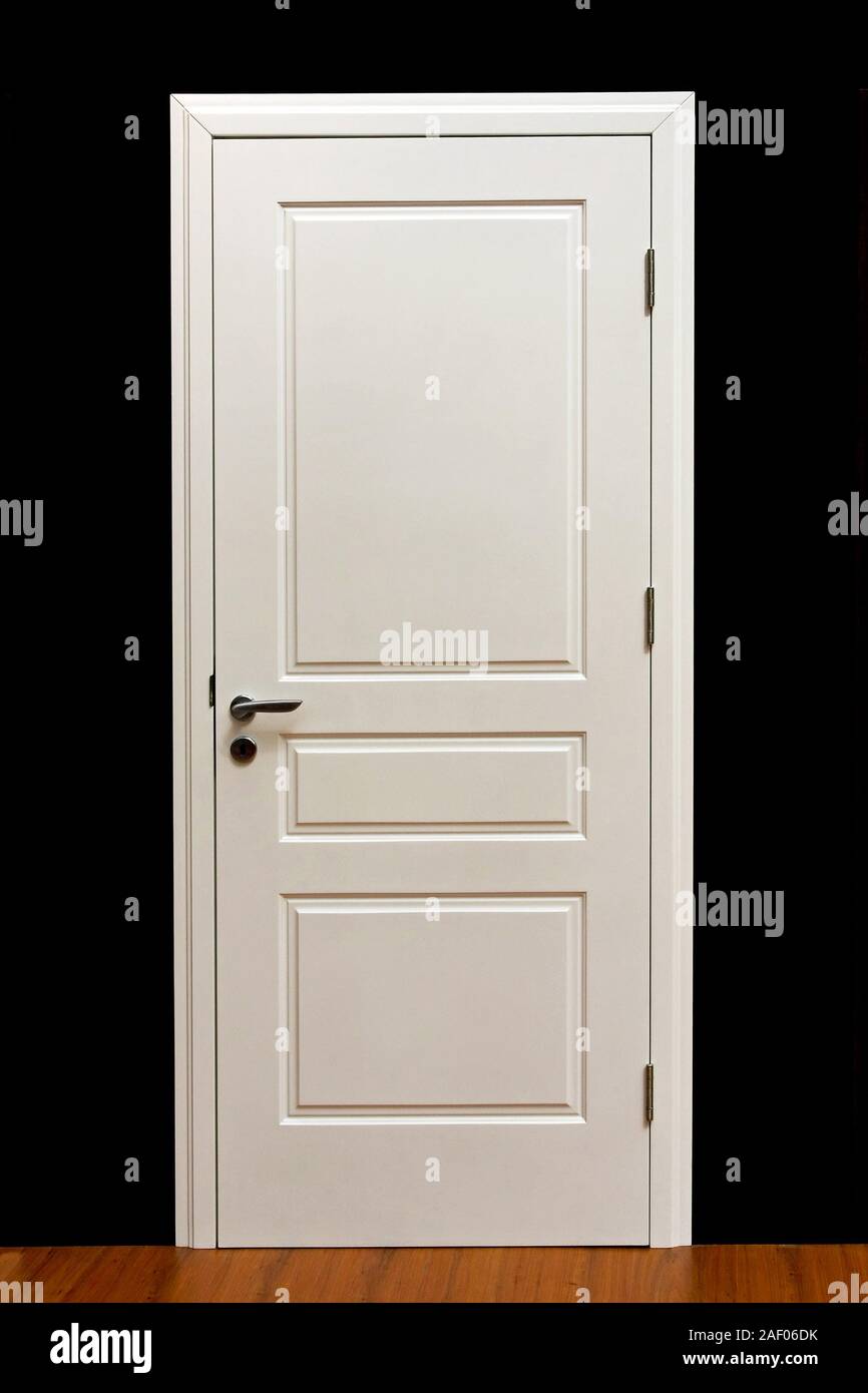 Closed white paint door in home interior Stock Photo Alamy