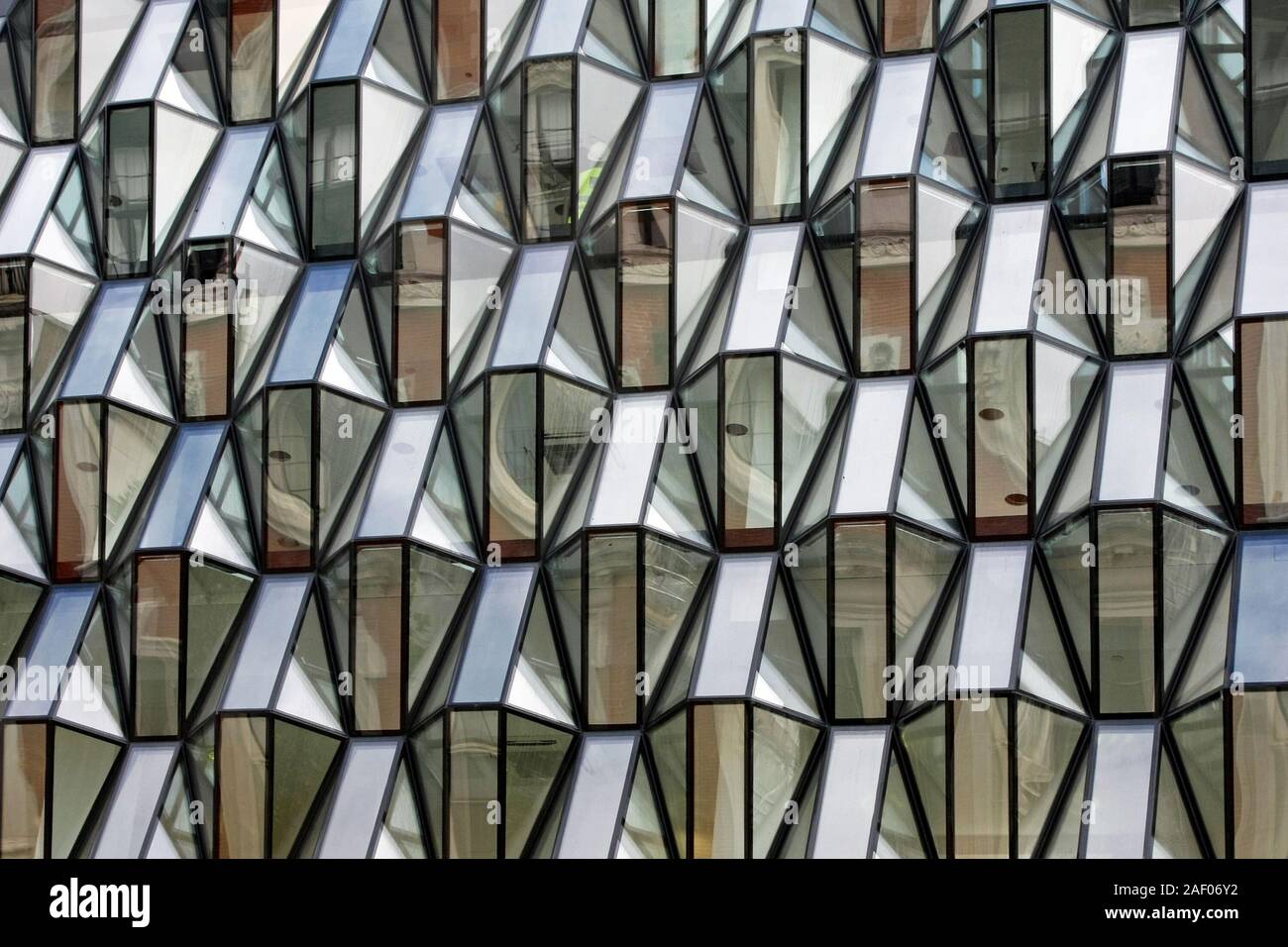 Geometric shape of glass facade at building Stock Photo - Alamy