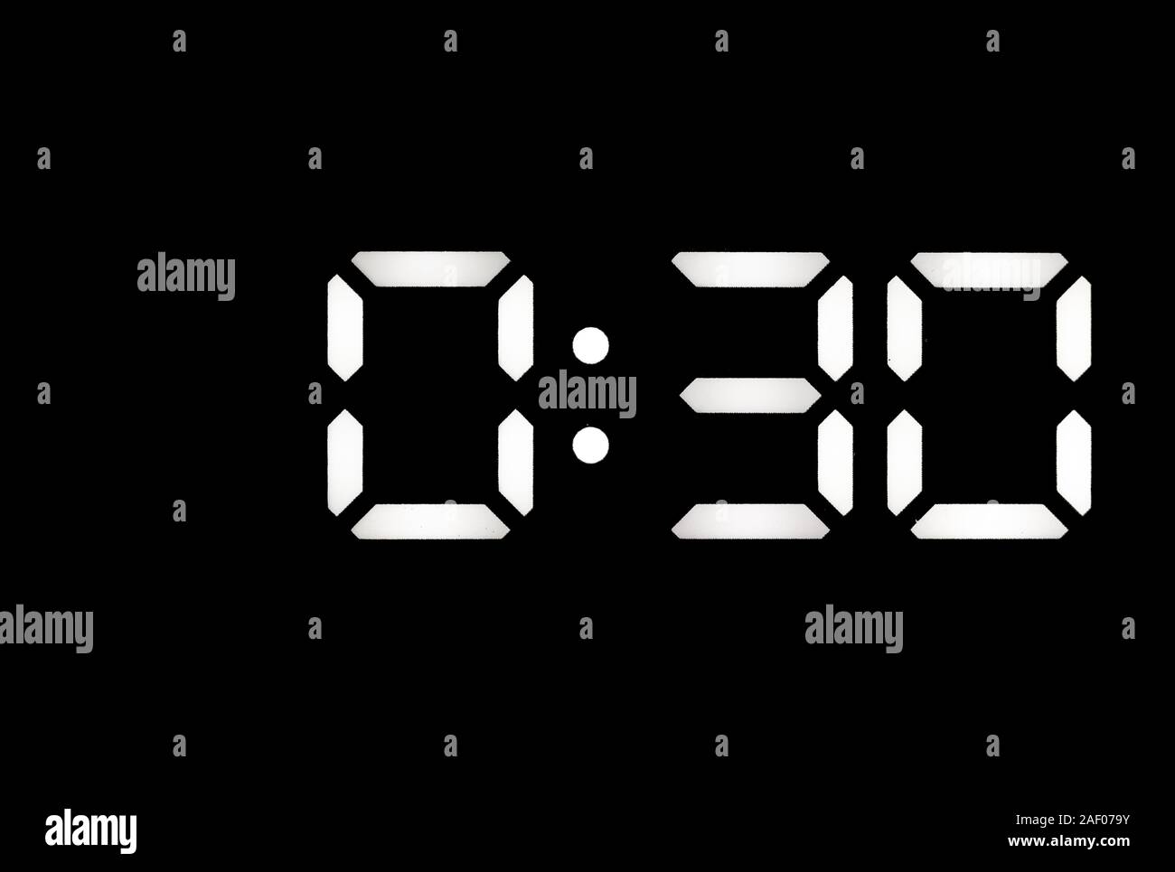 Real White Led Digital Clock On A Black Background Showing Time 0 30 Stock Photo Alamy Real White Led Digital Clock On A Black Background Showing Time 0 30 Stock Photo Alamy