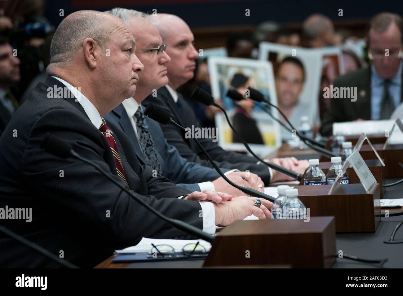 Washington, USA. 11th Dec, 2019. Steve Dickson (1st L, Front), chief of the Federal Aviation Administration (FAA), testifies before the House Committee on Transportation and Infrastructure during a hearing on 'The Boeing 737 MAX: Examining the Federal Aviation Administration's Oversight of the Aircraft's Certification' in Washington, DC, the United States, on Dec. 11, 2019. Steve Dickson said Wednesday that aviation regulators won't likely clear Boeing's troubled 737 Max airplanes for flight until 2020. Credit: Sarah Silbiger/Xinhua/Alamy Live News Stock Photo