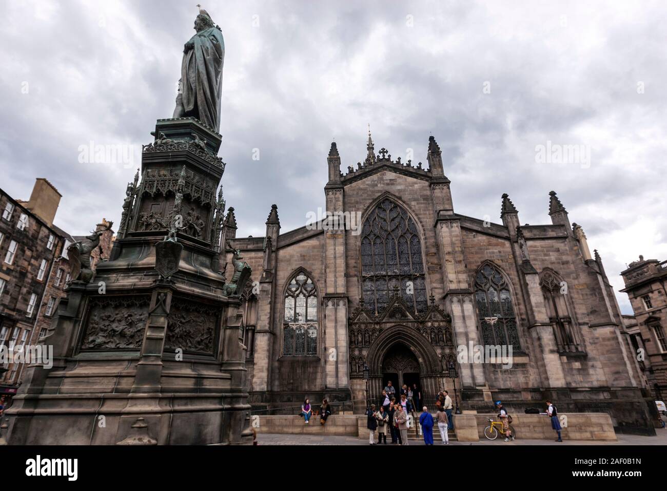 Statue of Walter Francis Montagu Douglas Scott and The west façade of St Giles' Cathedral, Edinburgh, Scotland, UK Stock Photo