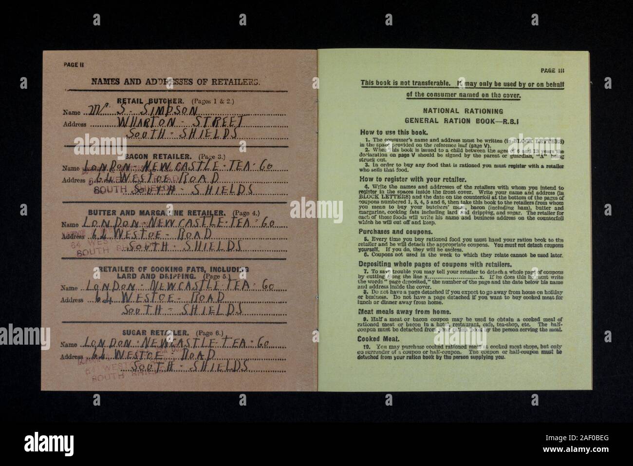 Inside page with list of retailers, Ministry of Food Junior Ration Book, a piece of World War II replica memorabilia relating to life in the UK. Stock Photo
