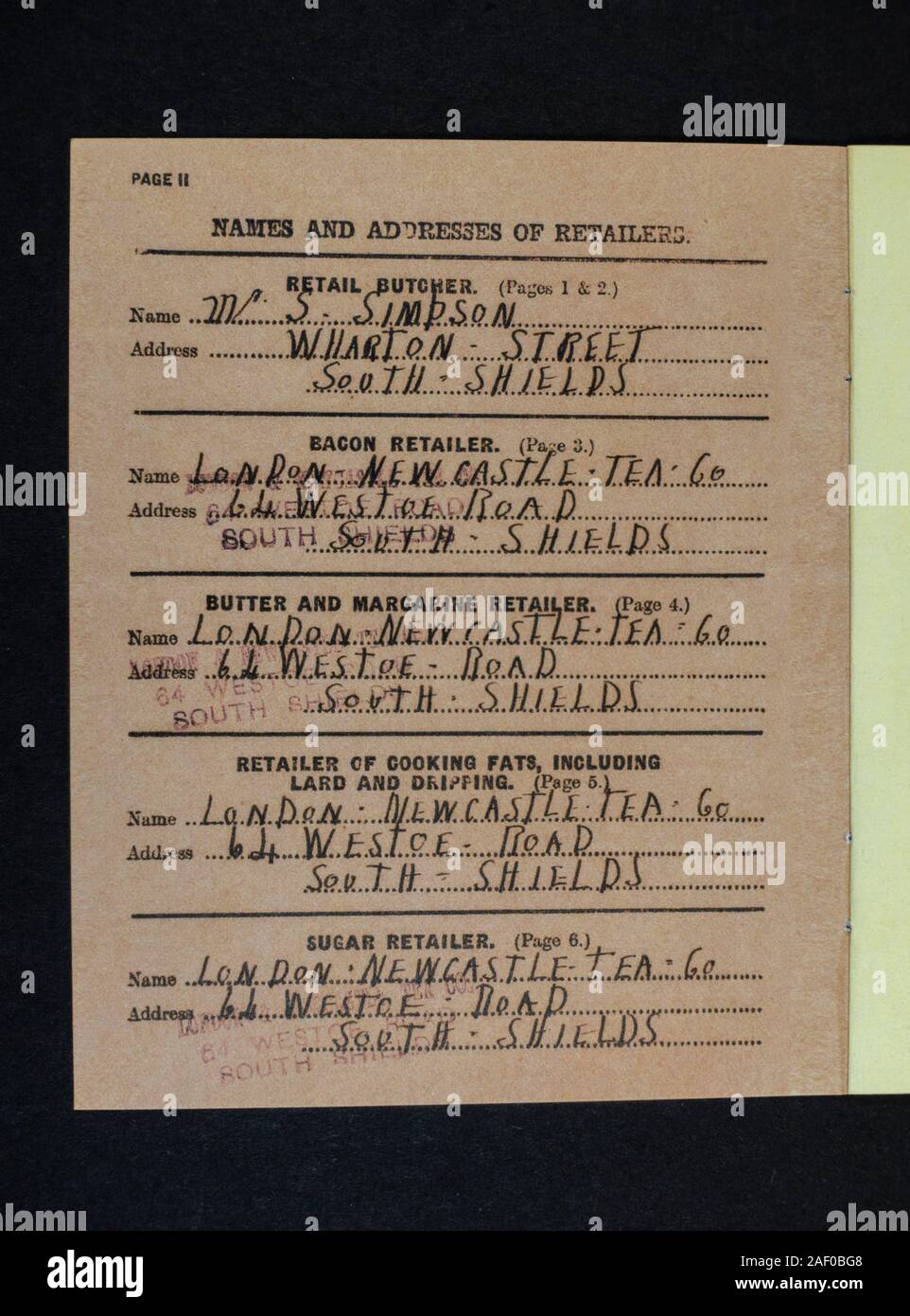 Inside page with list of retailers, Ministry of Food Junior Ration Book, a piece of World War II replica memorabilia relating to life in the UK. Stock Photo