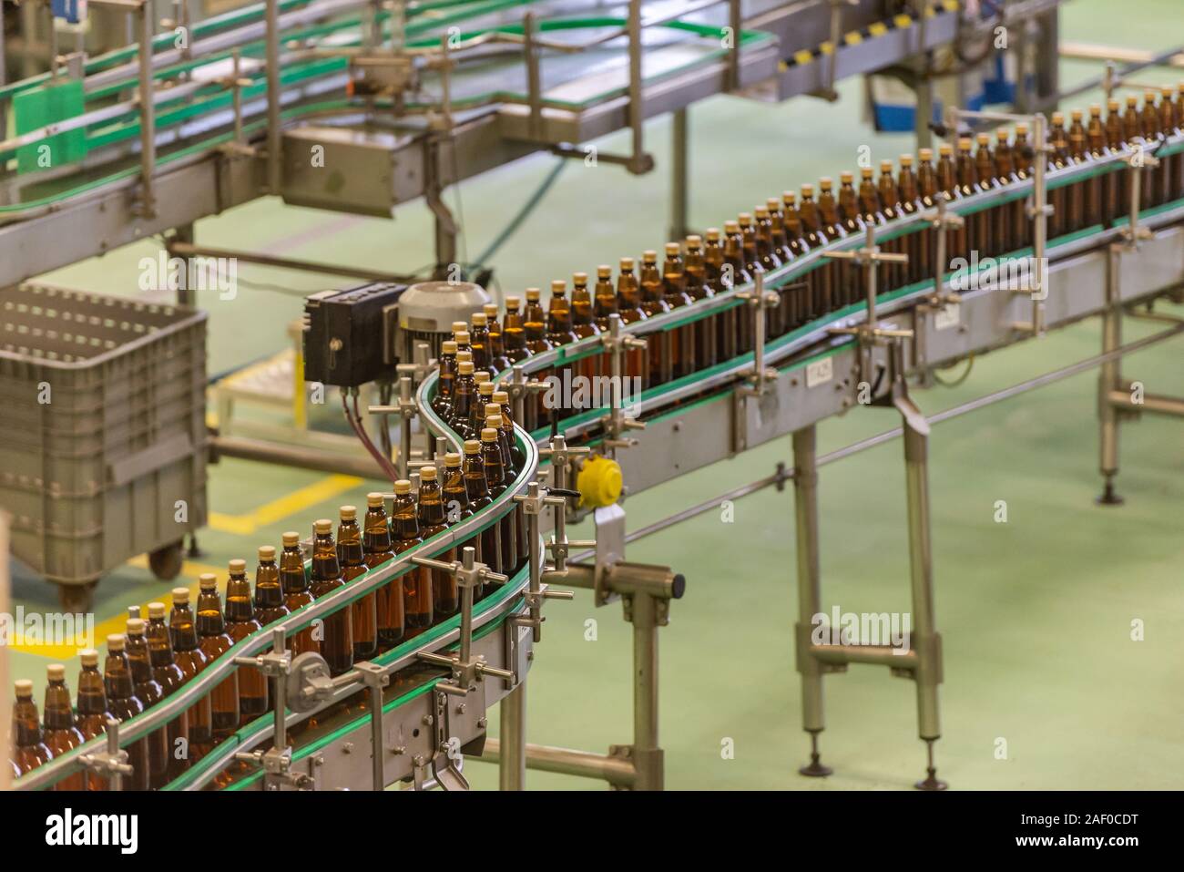 Beer production. Beverage bottling line. Plastic bottles in the factory