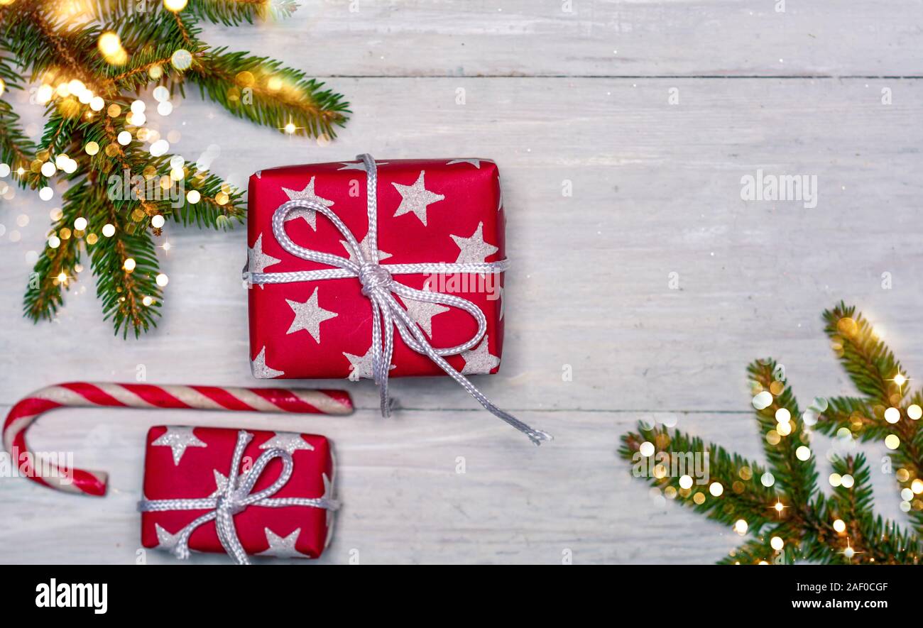 Christmas presents on a wooden table top view flat lay Stock Photo