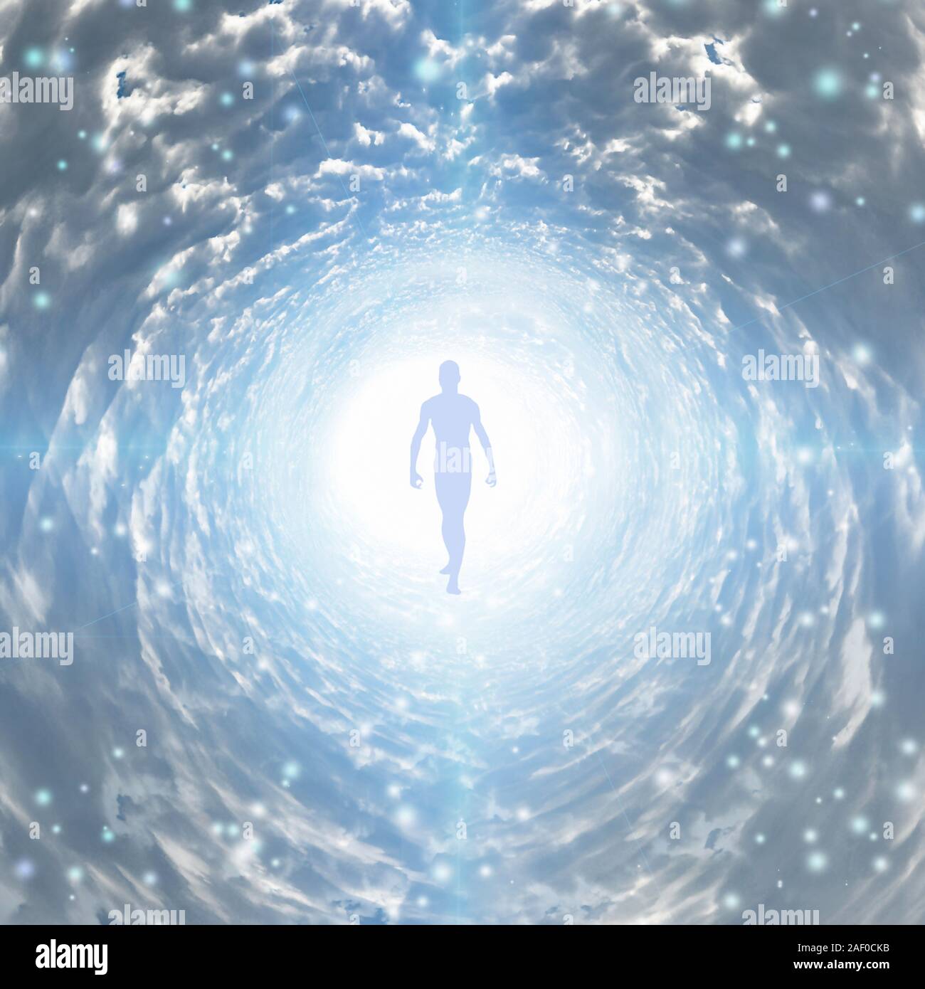 Tunnel of light with man figure Stock Photo