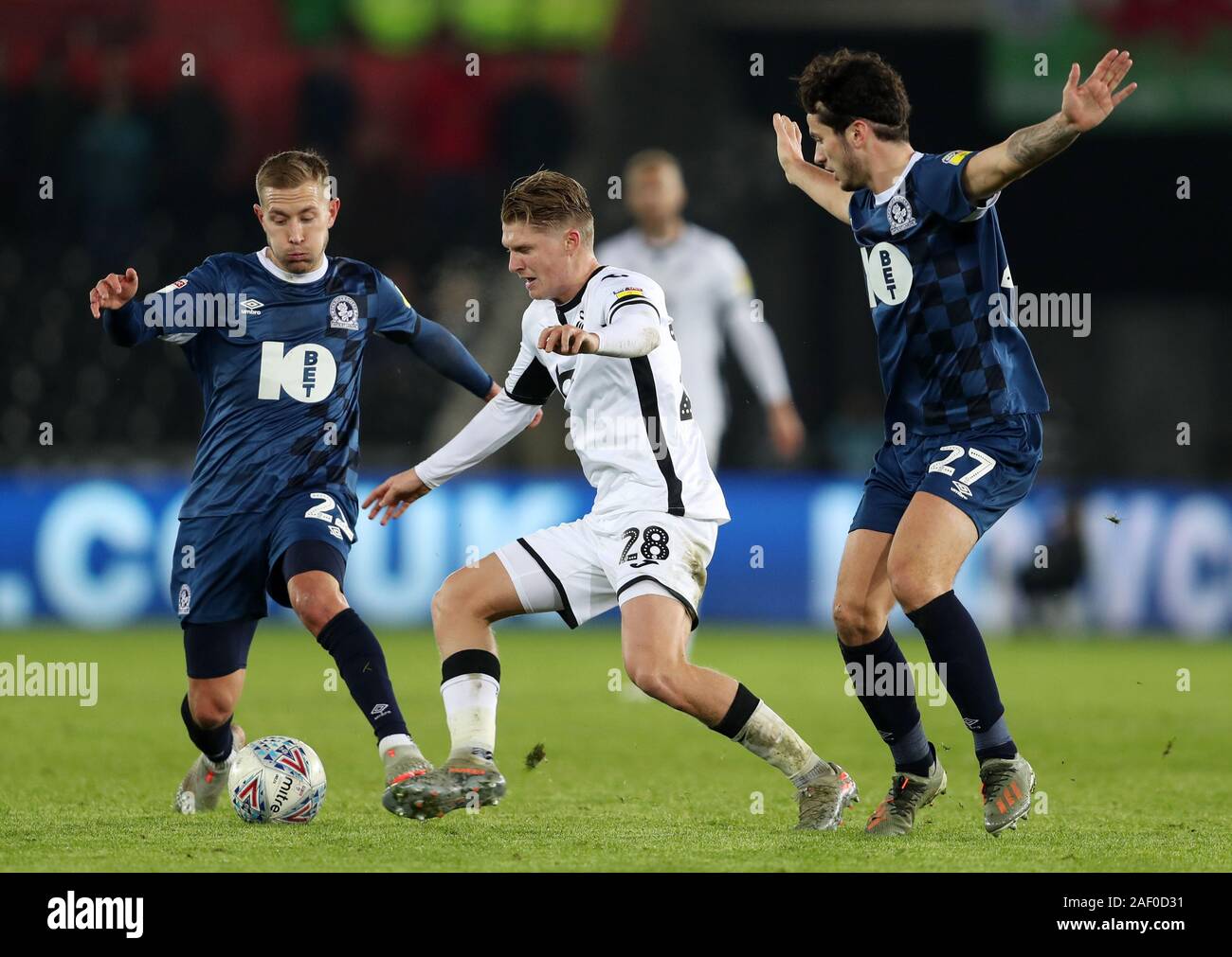 Blackburn Rovers' Lewis Travis competing with Millwall's George News  Photo - Getty Images