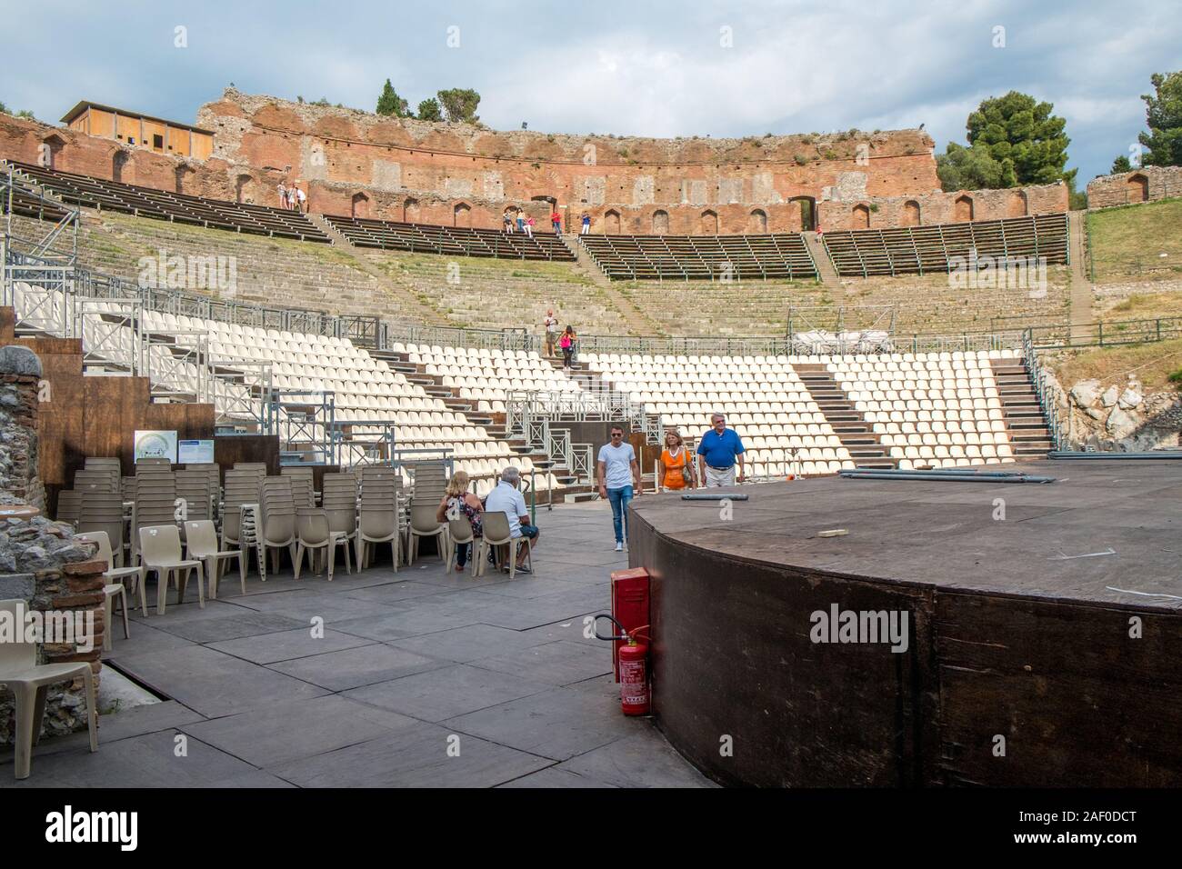 The ancient Greek theatre in Taormina. Historic Taormina is a major tourist destination on