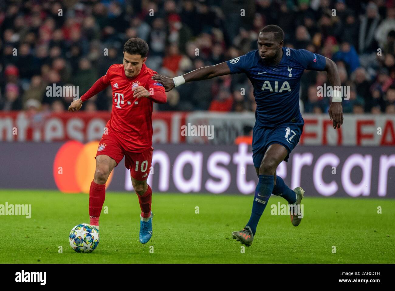 MUNICH, GERMANY - DECEMBER 11: Philippe Coutinho (FC Bayern Muenchen) and  Moussa Sissoko (Tottenham Hotspurs) at the Football, UEFA Champions League,  Matchday 6: FC Bayern Muenchen vs Tottenham Hotspur at the Allianz-Arena