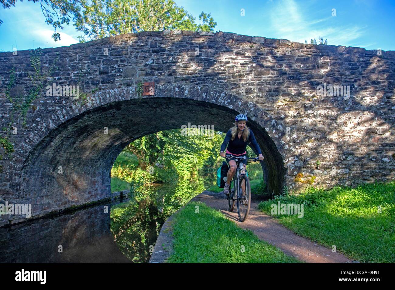 Cycling along the Monmouthshire and Brecon Canal Stock Photo