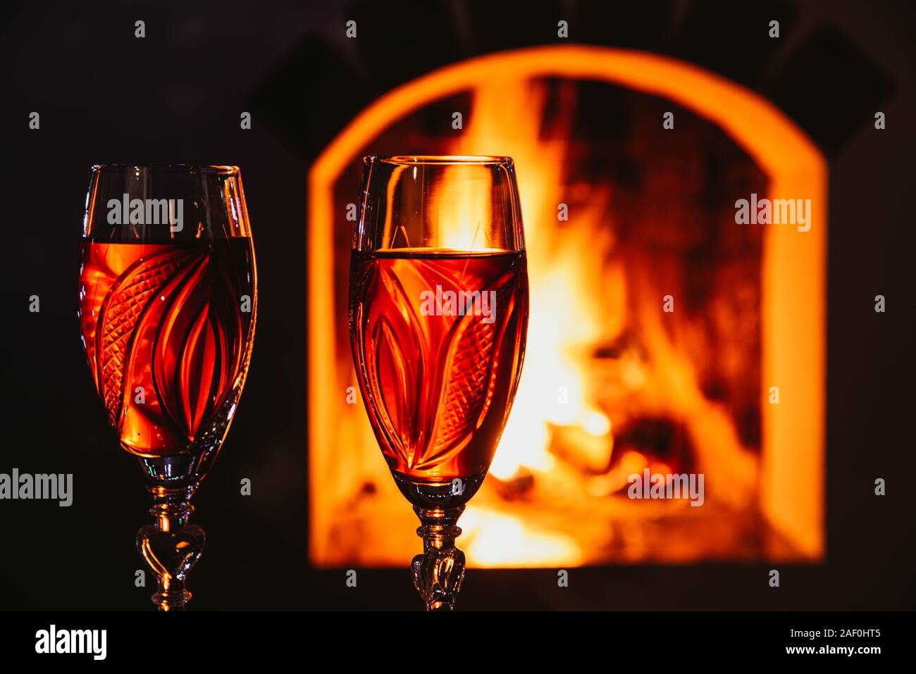 Delicious Red Wine At Romantic Fireplace Romantic Concept Stock