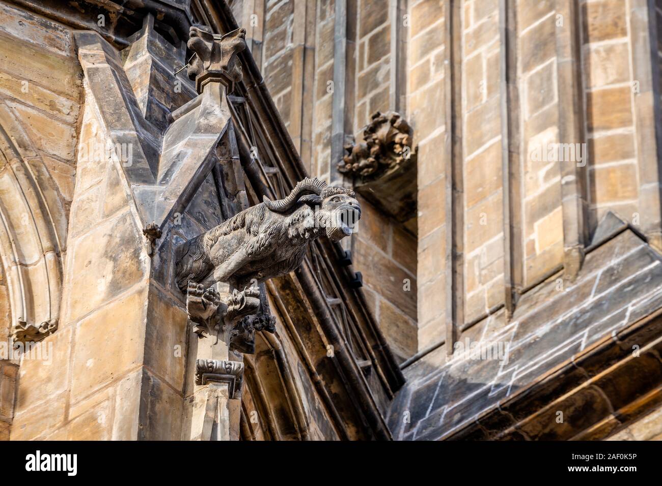 One of gargoyles of St. Vitus Cathedral (Cathedral of Saints Vitus, Wenceslaus and Adalbert) in Prague, Czech Republic. Stock Photo