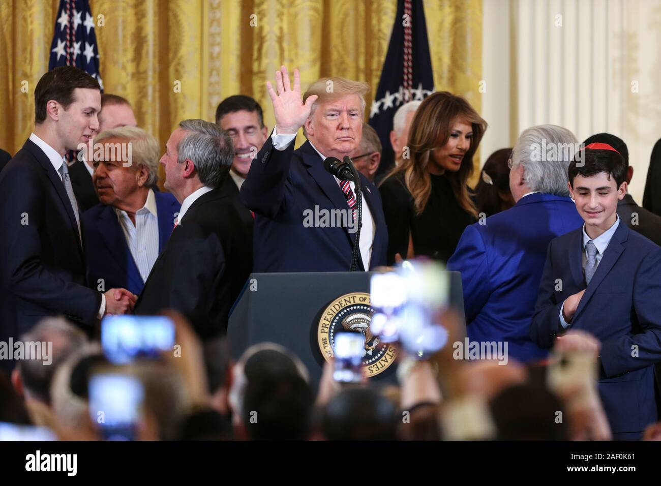 Washington, USA. 11th Dec, 2019. President Donald Trump gestures after he delivered remarks during a Hanukkah Reception on December 11, 2019 in Washington, DC. (Photo by Oliver Contreras/SIPA USA) Credit: Sipa USA/Alamy Live News Stock Photo