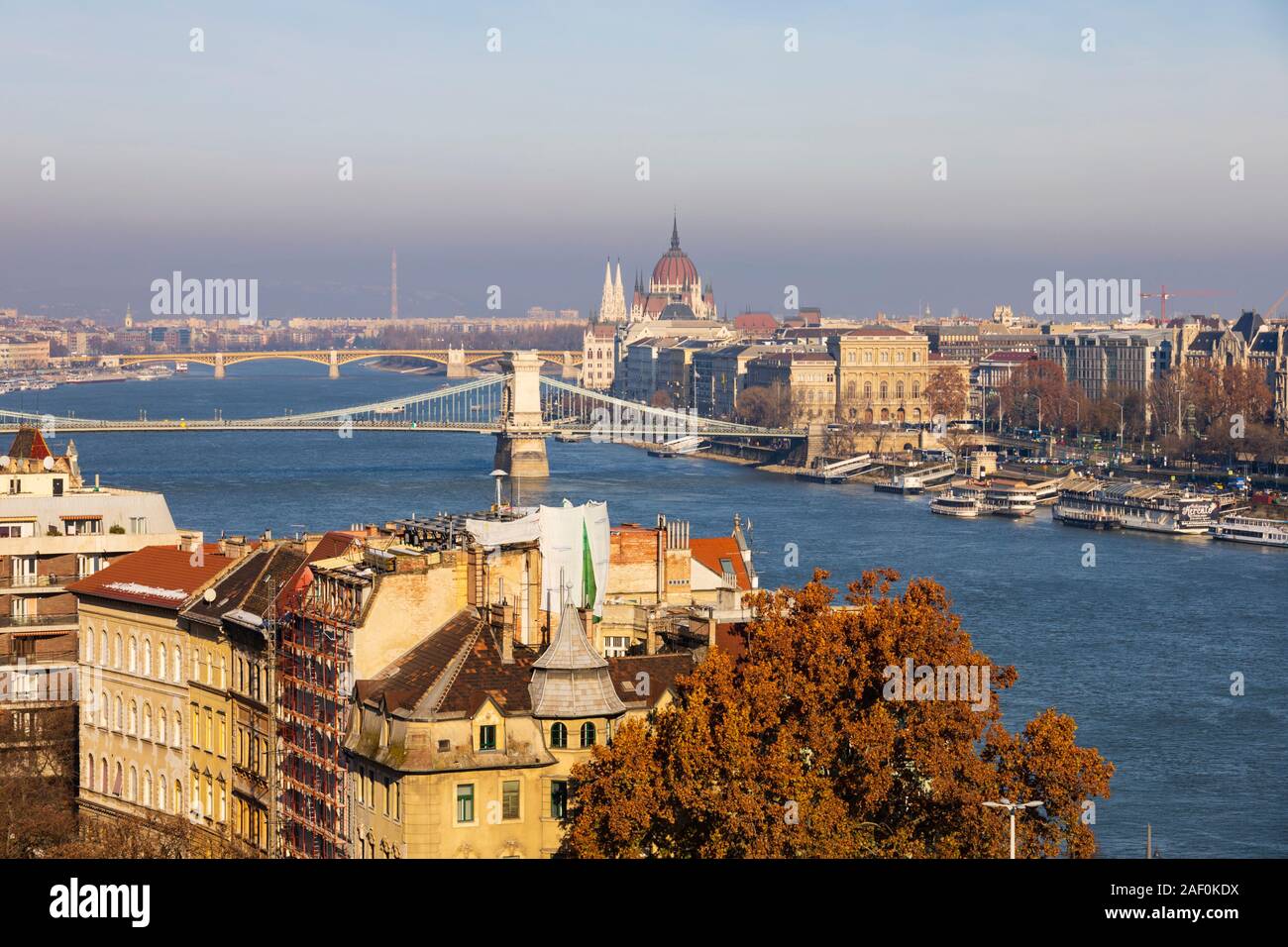View across the River Danube to the Parliament Building and Chain Bridge. Winter in Budapest, Hungary. December 2019 Stock Photo