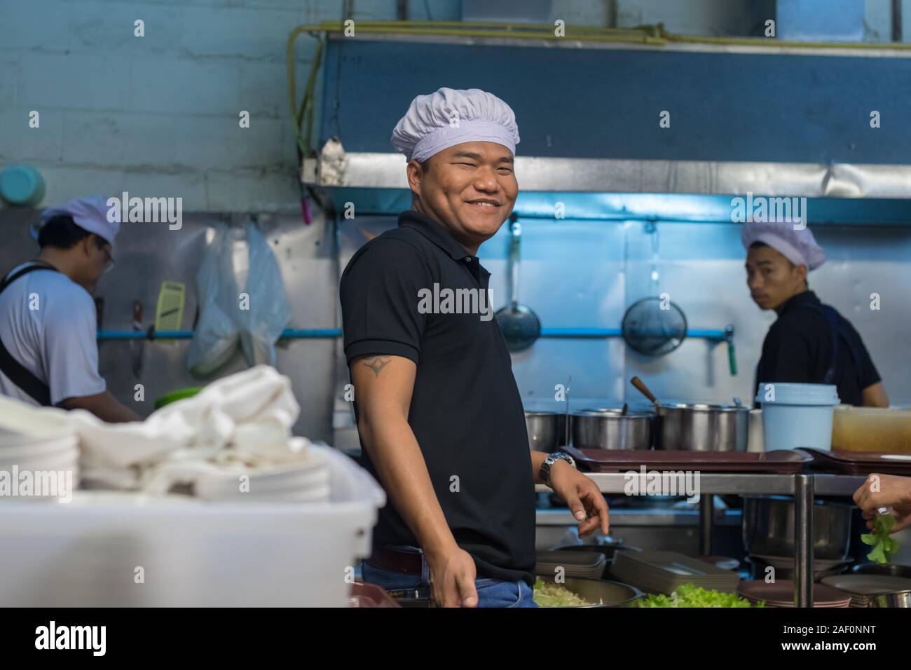 Chef in a kitchen in Chiang Mai Stock Photo