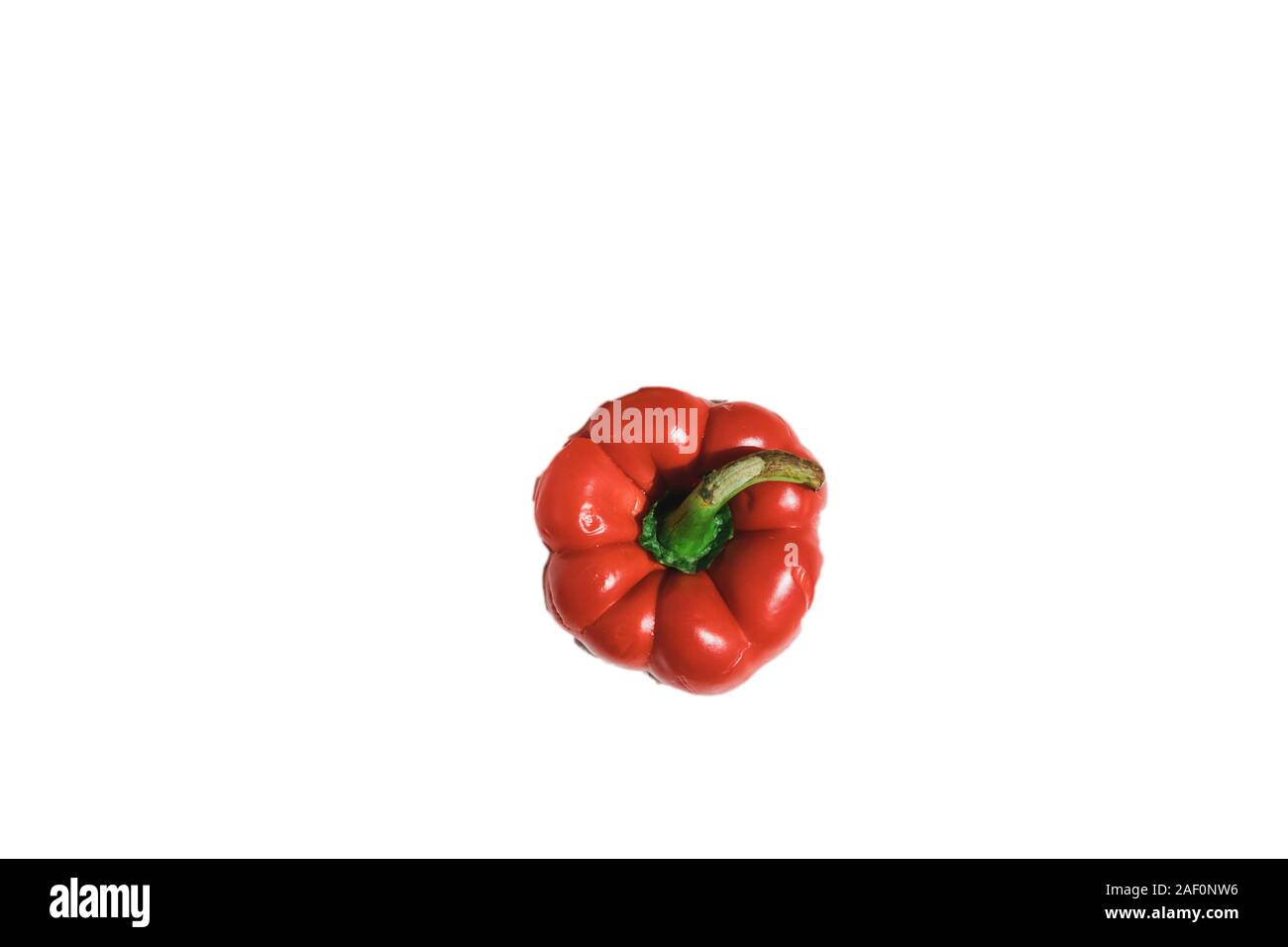 fresh red bell pepper on white background Stock Photo - Alamy