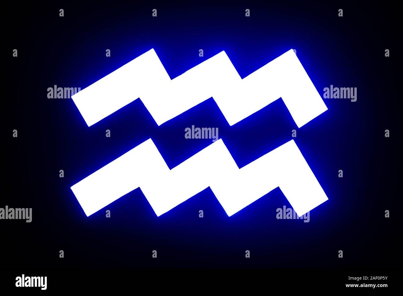blue illuminated Aquarius zodiac sign isolated on black Stock Photo - Alamy