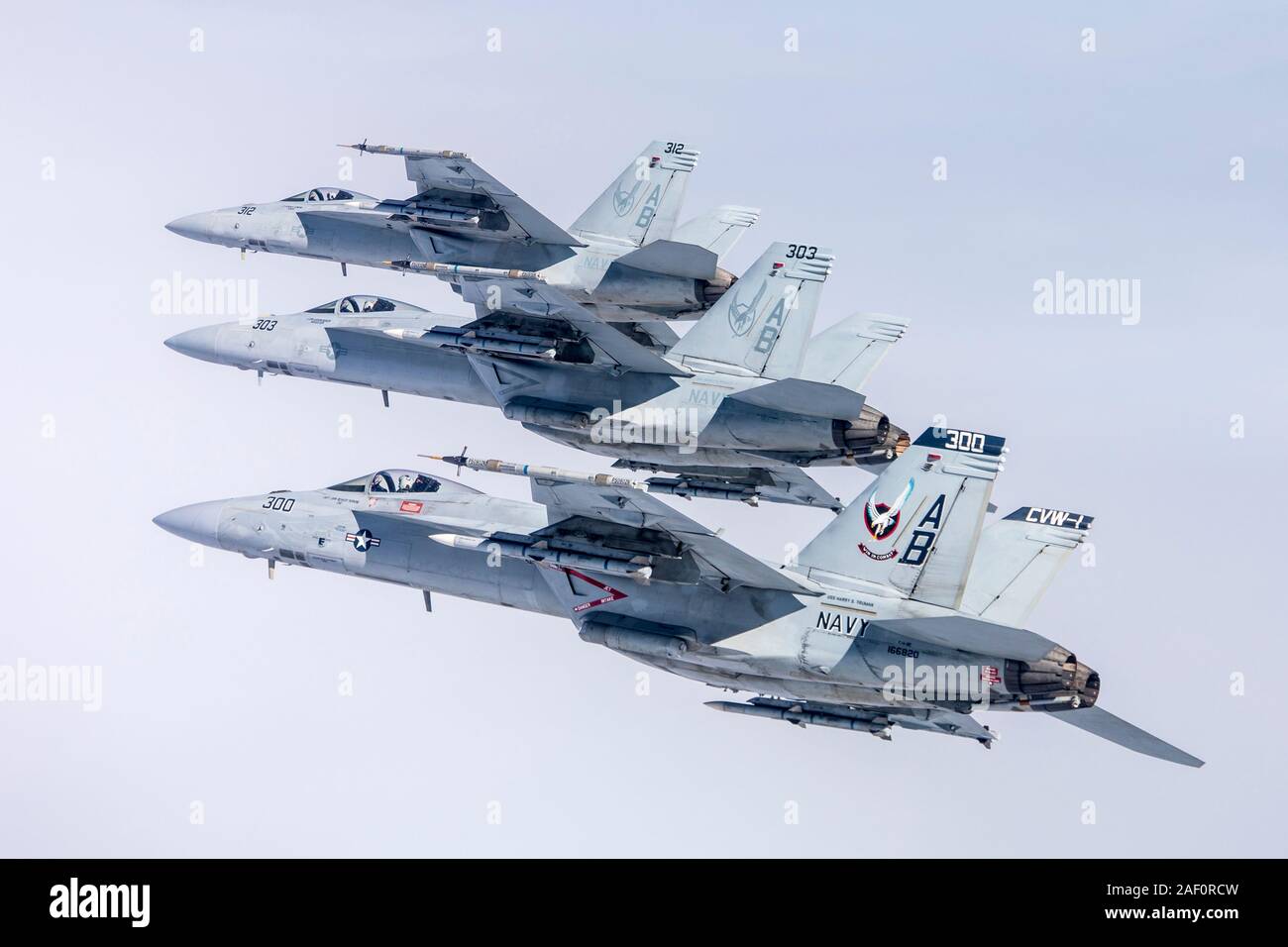 LEMOORE, California (March 7, 2019) Three F/A-18E aircraft from Naval Air Station (NAS) Lemoore flown by LT Phil 'Quitter' Murphy, LCDR Sean 'Dora' Tuohy, and LT Nicholas 'D-POD' Corey from Strike Fighter Squadron (VFA) 136 'Knighthawks' fly in formation over the Sea Test Range Range after completing a training mission.  (U.S. Navy photo by Lt. Cmdr. Darin Russell/Released) Stock Photo