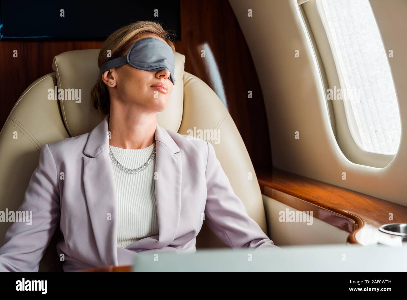 Woman sleeping plane hires stock photography and images Alamy