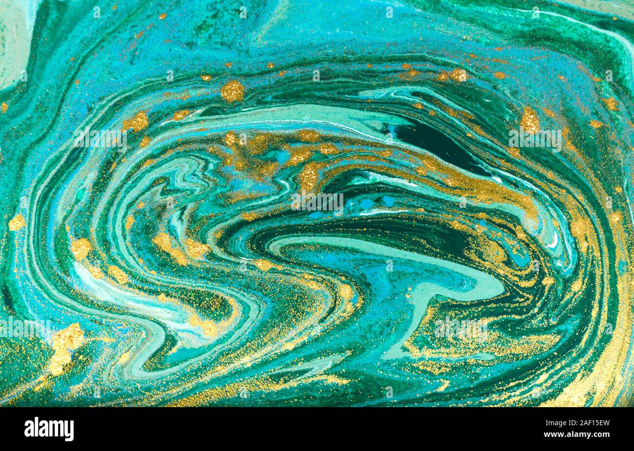 Green and gold ripple of agate background. Golden powder marble texture. Stock Photo