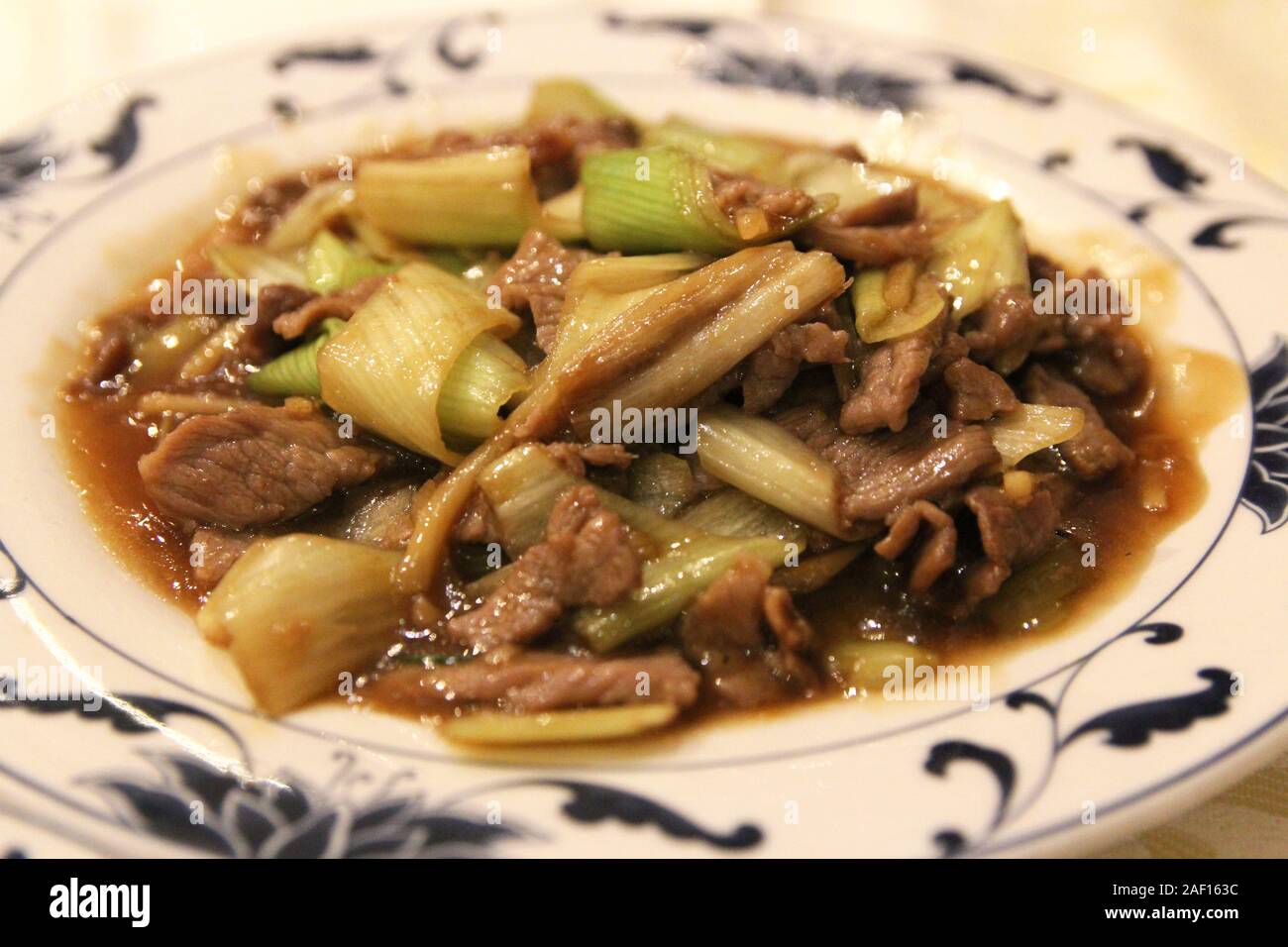 Stirfried beef with scallions in gravy sauce in a Chinese restaurant Stock Photo Alamy