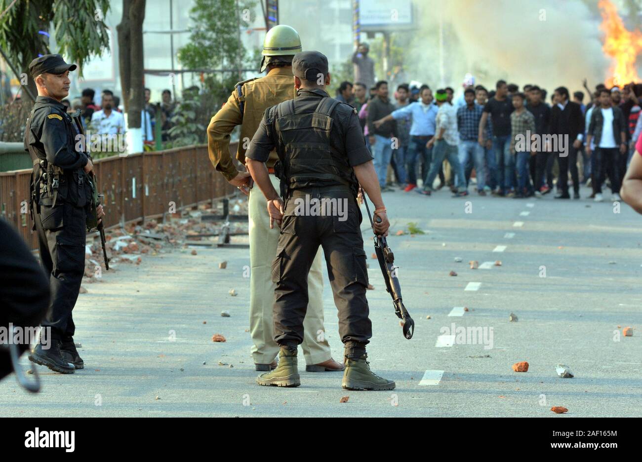 Guwahati, India. 11th Dec, 2019. Police disperse protestors demonstrating against the Citizenship Amendment Bill (CAB) in Guwahati, India, Dec. 11, 2019. The upper house of Indian parliament, or Rajya Sabha, passed the controversial Citizenship Amendment Bill (CAB) Wednesday evening, officials said. Credit: Str/Xinhua/Alamy Live News Stock Photo