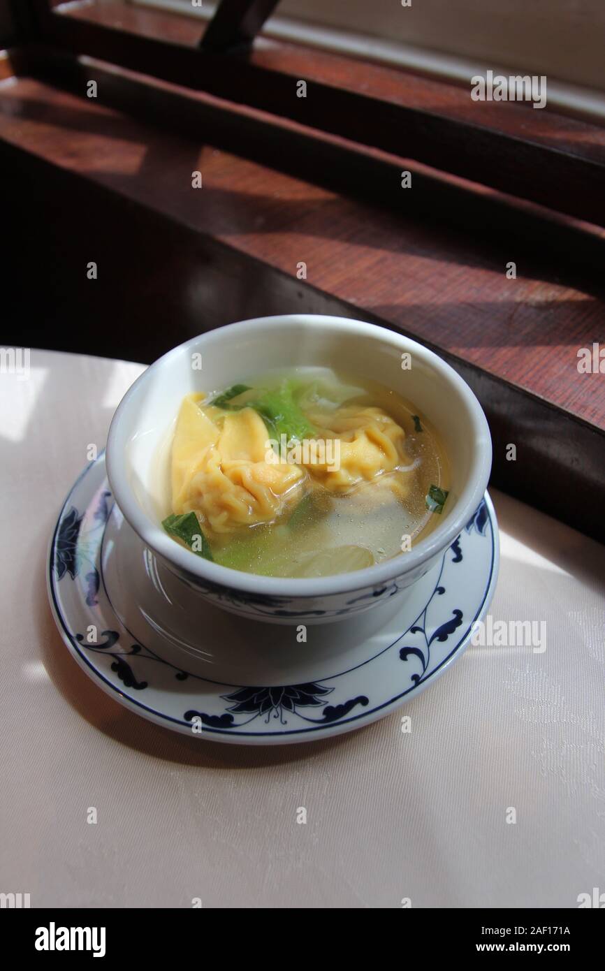 Shrimp And Pork Dumpling Wonton Soup With Vegetables Near The Window In A Chinese Restaurant Stock Photo Alamy