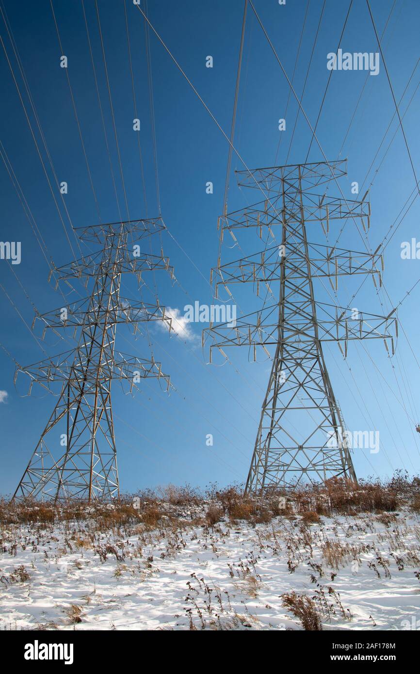 tower of electrical high voltage power on blue sky Stock Photo - Alamy