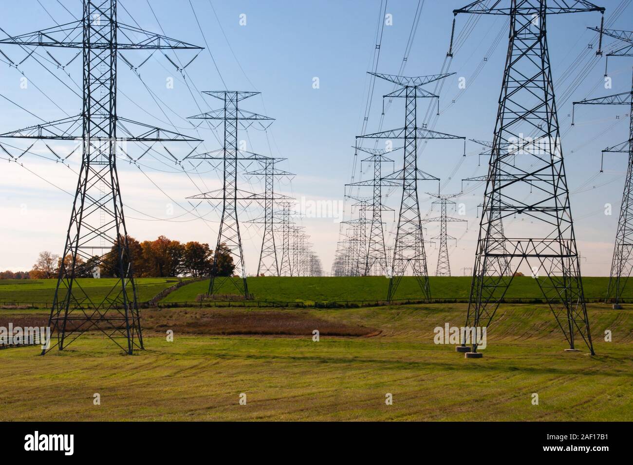 tower of electrical high voltage power on blue sky Stock Photo - Alamy