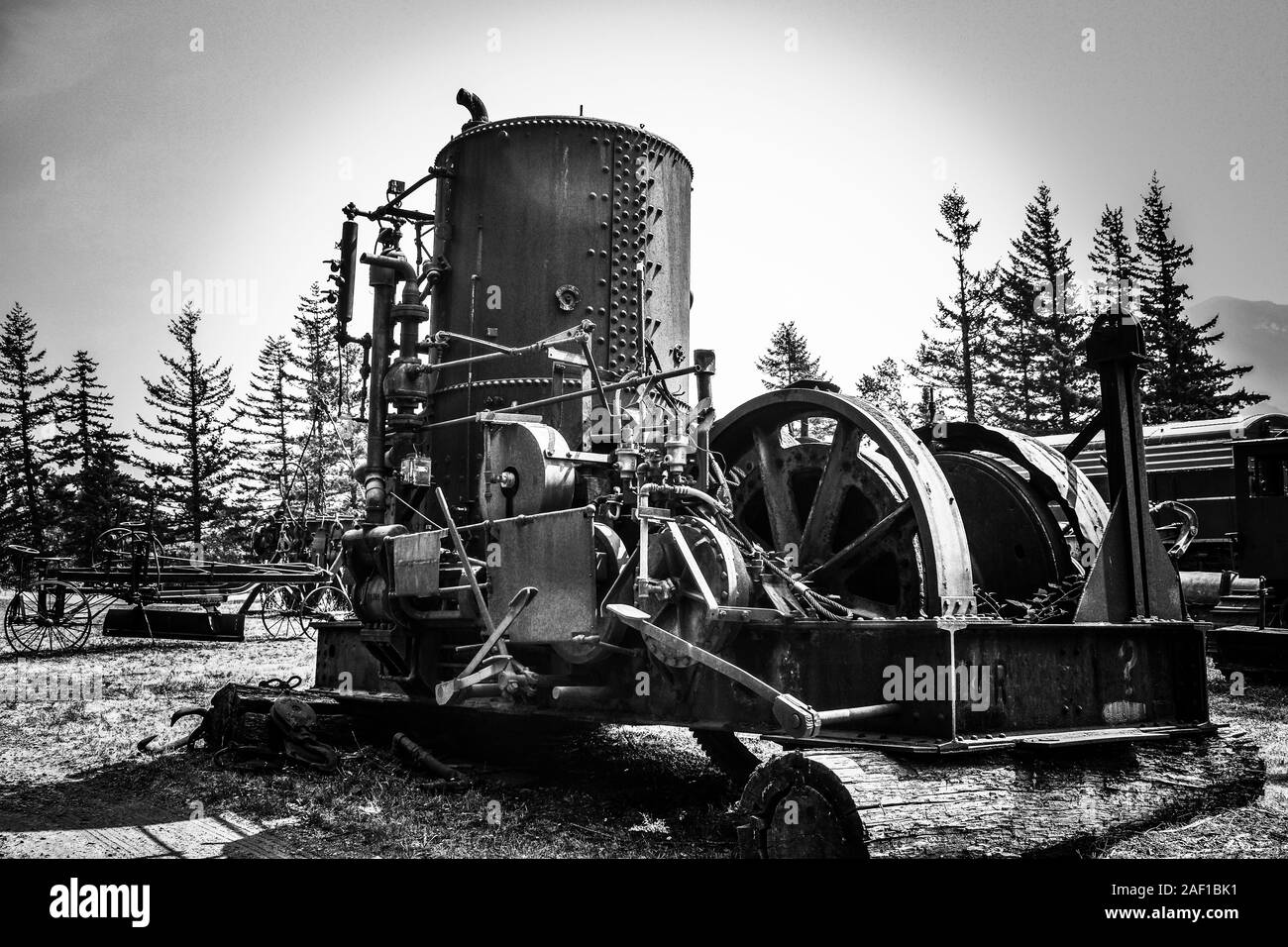 Old Logging Steam Donkey was used to harvested trees for homes in the Pacific Northwest Stock Photo