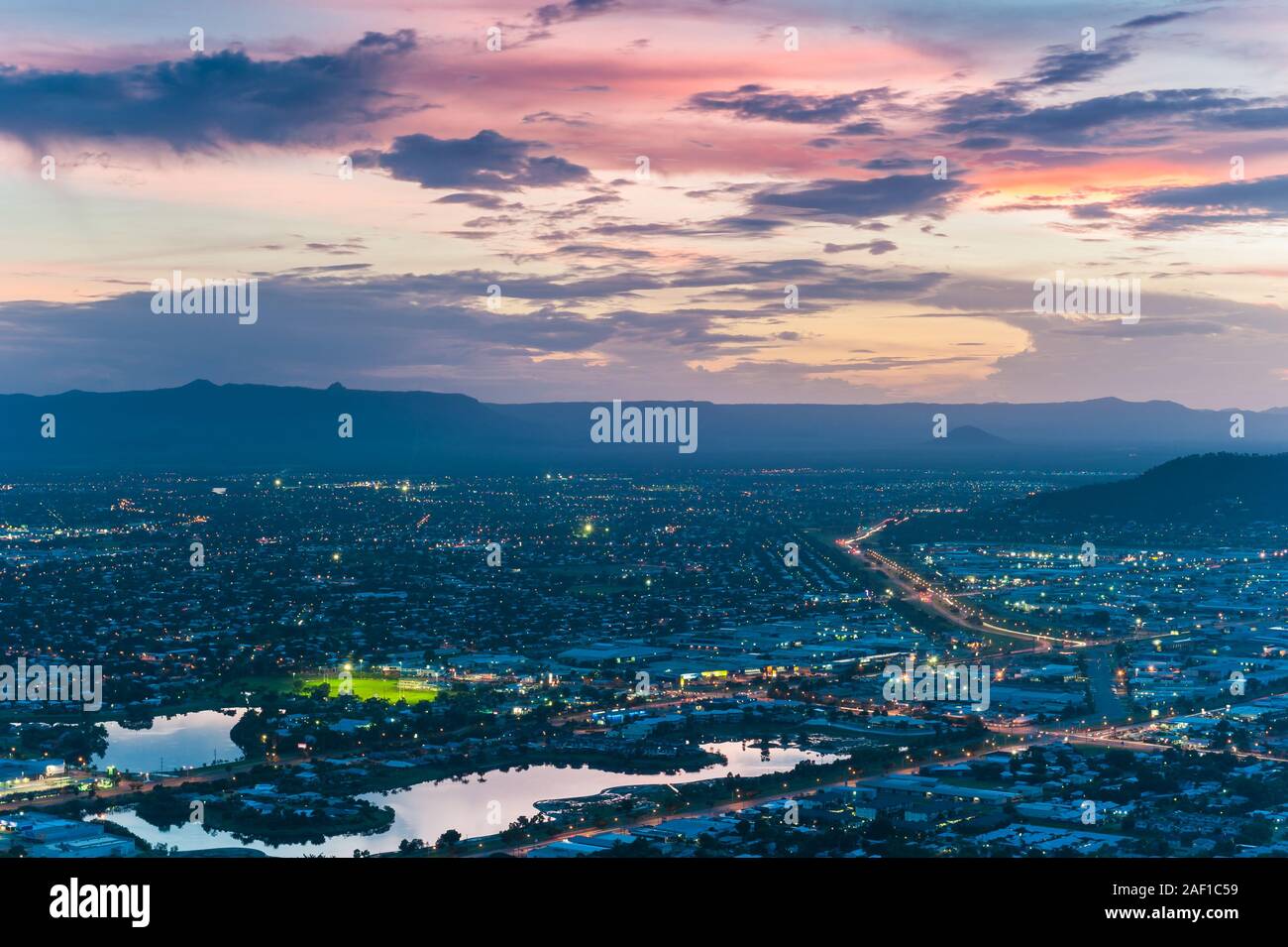 Urban scenic after sunset of Townsville with street lights and beautiful sunset colours. Stock Photo