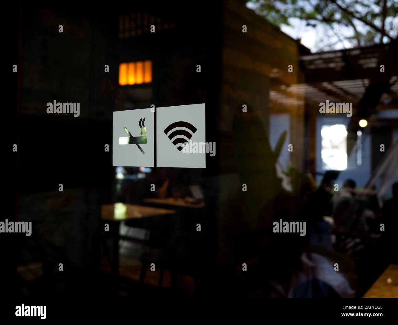 Signs On Glass Door No Smoking Sign Wireless Signal Icon Sign For Free Wifi On Cafe Background Decal Sticker Signs Pasted On Front Door Outside The Stock Photo Alamy