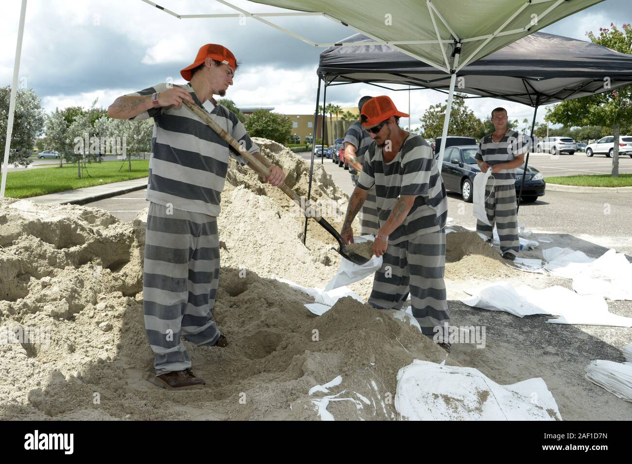 Melbourne, United States. 12th Dec, 2019. In preparation for Hurricane Dorian, inmates from Brevard County Jail fill sandbags and place them into the vehicles of waiting motorists near Melbourne, Florida, on Thursday, August 29, 2019. Central Floridians are making preparations for the storm, which is anticipated to grow into a Category 4 system as it approaches the area sometime on Monday. Photo by Joe Marino/UPI Credit: UPI/Alamy Live News Stock Photo