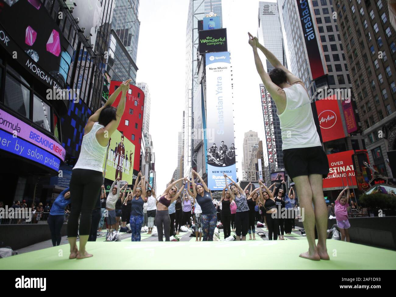 New York, United States. 12th Dec, 2019. People participate in yoga classes in Times Square to celebrate the Summer Solstice on the first day of Summer in New York City on June 21, 2019. Thousands of yogis will participate in eight yoga classes during the 16th annual Solstice in Times Square. Photo by John Angelillo/UPI Credit: UPI/Alamy Live News Stock Photo