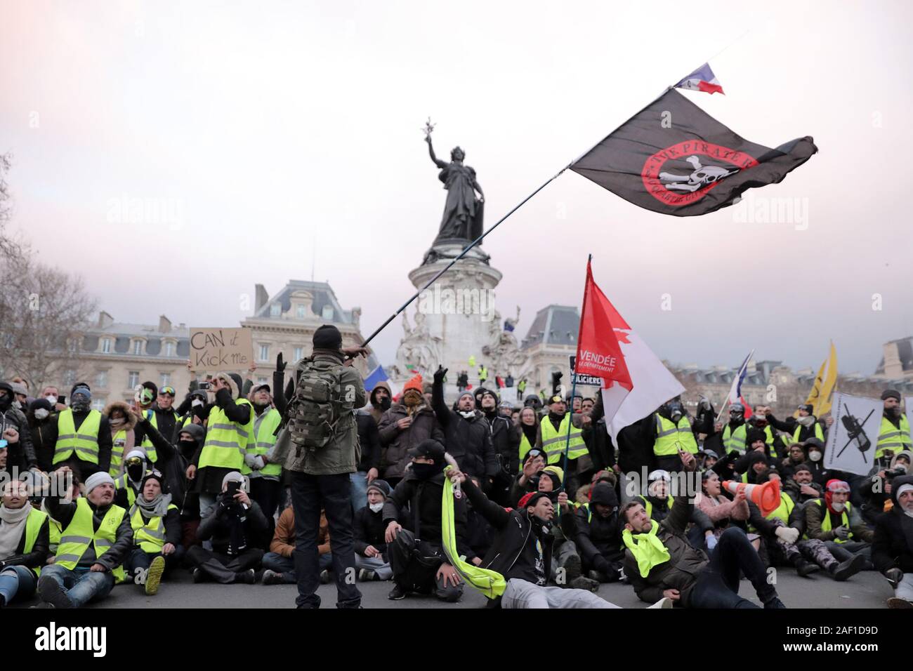 Paris, France. 12th Dec, 2019. Yellow Vest demonstrators protest beneath the statue of Marianne, the symbol of the French Republic, in Paris, on February 2, 2019. The protestors took to the streets of the capital and other major French cities to denounce police violence during anti-government marches. Photo by Eco Clement/UPI Credit: UPI/Alamy Live News Stock Photo