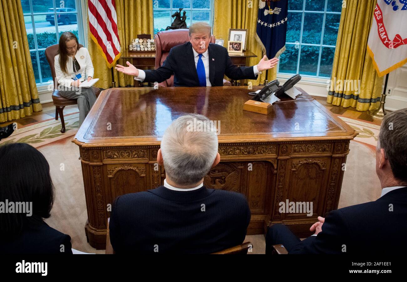 Washington, United States. 12th Dec, 2019. President Donald Trump (top) meets with Chinese Vice Premier Liu He (C) on China-US trade, in the Oval Office at the White House in Washington, DC, on February 22, 2019. The two were joined by U.S. Administration officials, including U.S. Trade Representative Robert Lighthizer (R). Photo by Kevin Dietsch/UPI Credit: UPI/Alamy Live News Stock Photo