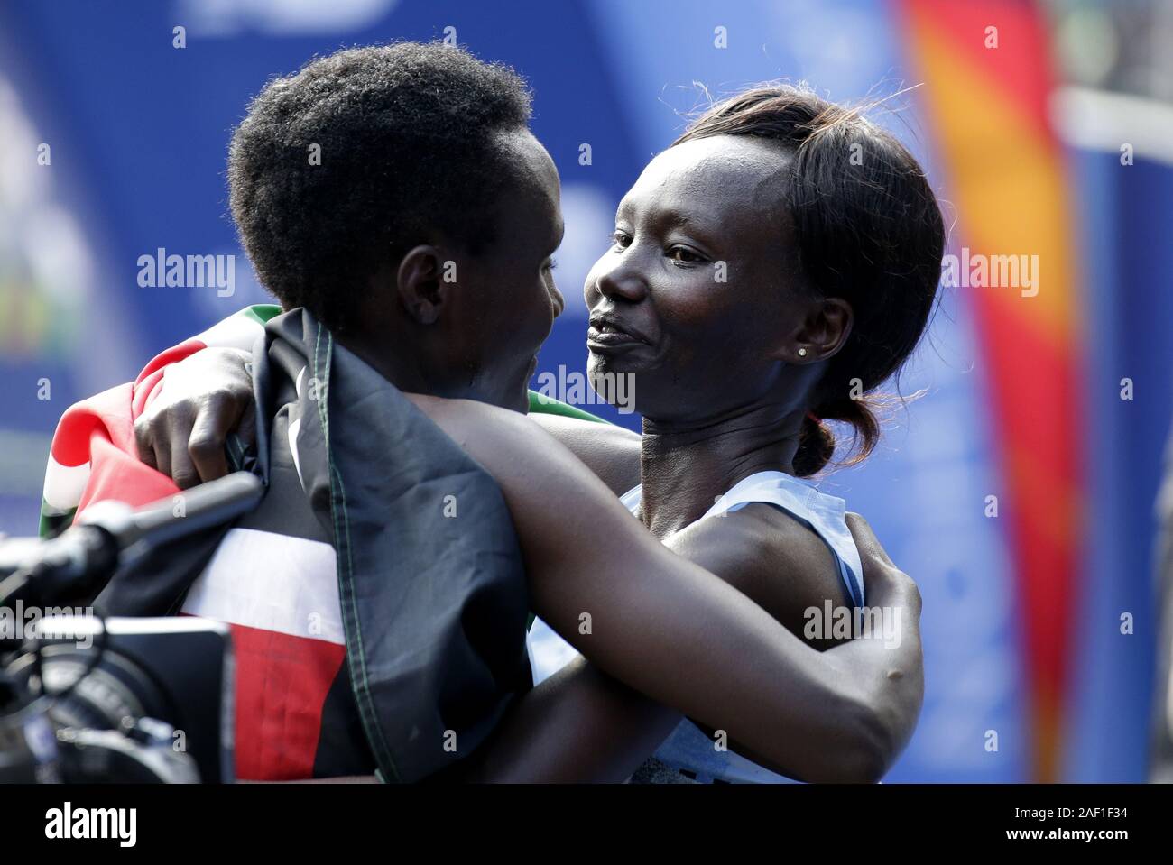 New York, United States. 12th Dec, 2019. Joyciline Jepkosgei of Kenya hugs 2nd place finisher Mary Keitany after winning the Women's 2019 NYRR TCS New York City Marathon in New York City on Sunday, November 3, 2019. Over 50,000 runners from New York City and around the world will race through the five boroughs on a course that winds its way from the Verrazano Bridge before crossing the finish line by Tavern on the Green in Central Park. Photo by John Angelillo/UPI Credit: UPI/Alamy Live News Stock Photo