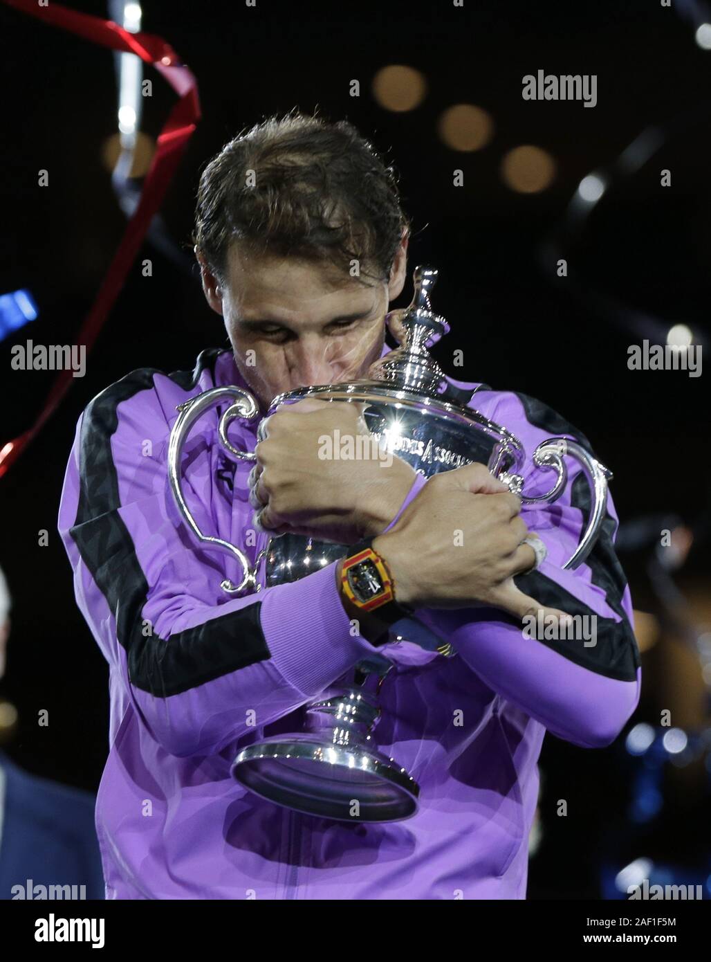 Flushing Meadow, United States. 12th Dec, 2019. Rafael Nadal of Spain hugs the championship trophy after defeating Daniil Medvedev of Russia in 5 sets to win the Men's Final in Arthur Ashe Stadium at the 2019 US Open Tennis Championships at the USTA Billie Jean King National Tennis Center on Sunday, September 8, 2019, in New York City. Nadal defeated Medvedev 7-5, 6-3, 5-7, 4-6, 6-4 to win his 4th US Open Championship. Photo by John Angelillo/UPI Credit: UPI/Alamy Live News Stock Photo