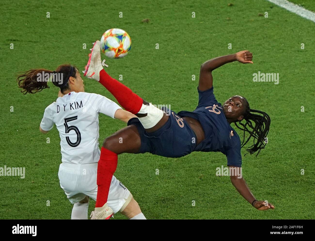 Paris, France. 12th Dec, 2019. Griedge Mbock Bathy uses a bicycle kick to score a goal, which was then disallowed, during the FIFA Women's World Cup opening match between France and Korea at the Parc des Princes near Paris on June 7, 2019. The goal was reversed after VAR (Video assistant referee) showed Bathy was offside. This is the first time VAR has been used in the Women's World Cup. France won 4-0. Photo by David Silpa/UPI Credit: UPI/Alamy Live News Stock Photo