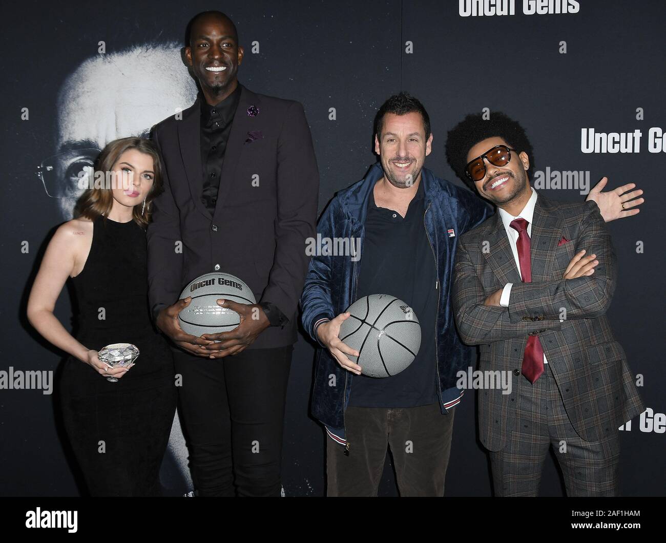 Los Angeles, USA. 11th Dec, 2019. (L-R) Julia Fox, Kevin Garnett, Adam Sandler and The Weeknd at the UNCUT GEMS Los Angeles Premiere held at the ArcLight Cinerama Dome in Los Angeles, CA on Wednesday, ?December 11, 2019. (Photo By Sthanlee B. Mirador/Sipa USA) Credit: Sipa USA/Alamy Live News Stock Photo