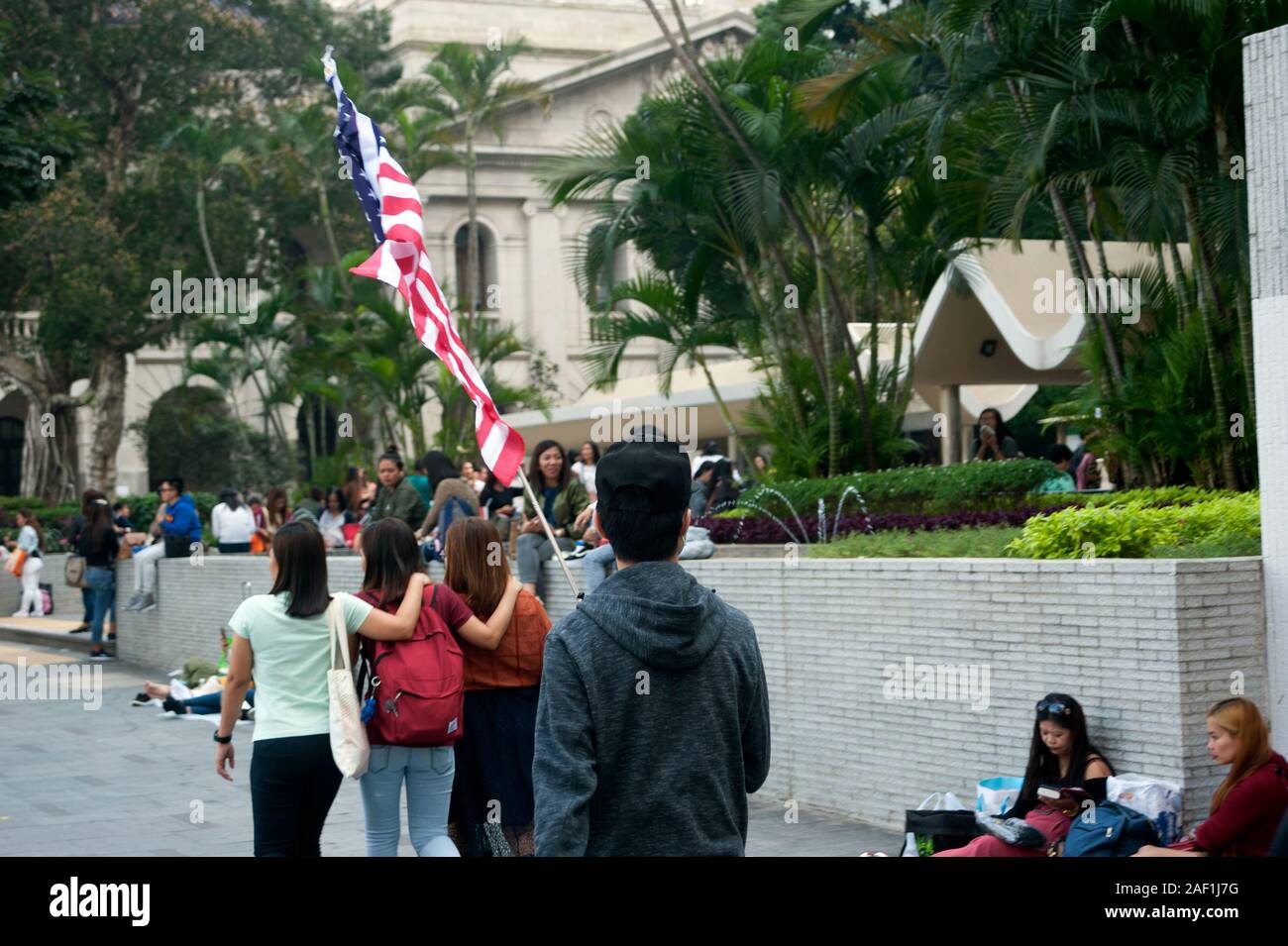 Hong Kong protesters carry the Stars & Stripes flag in support of the USA against the Chinese government and the CPC,Hong Kong, China, South East Asia Stock Photo