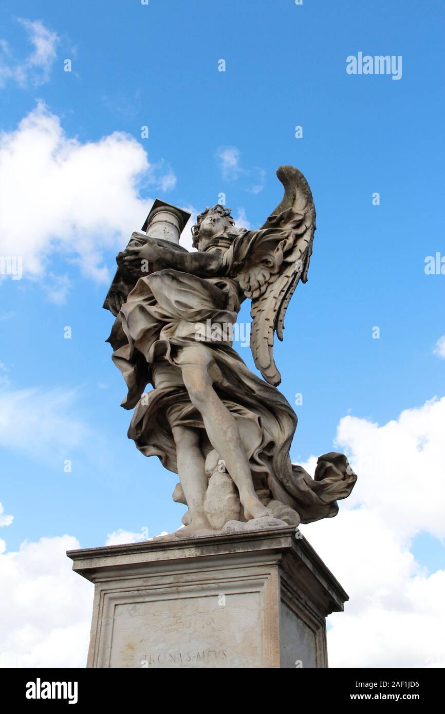 Angel Carrying the Column by Antonio Raggi at Castel Sant'Angelo, Rome, Italy Stock Photo