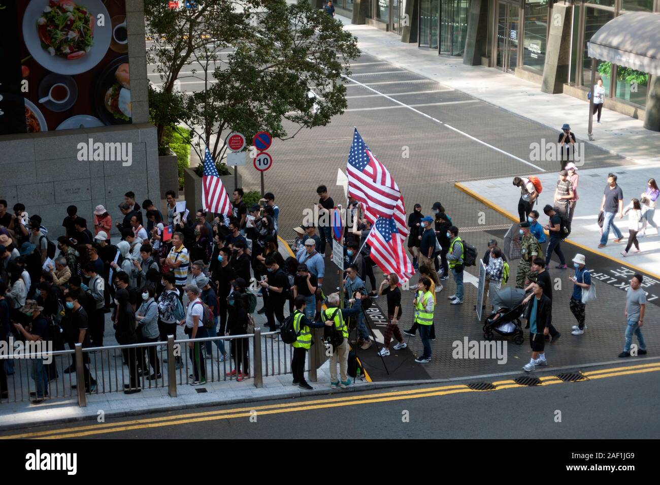 Hong Kong protesters carry the Stars & Stripes flag in support of the USA against the Chinese government and the CPC,Hong Kong, China, South East Asia Stock Photo