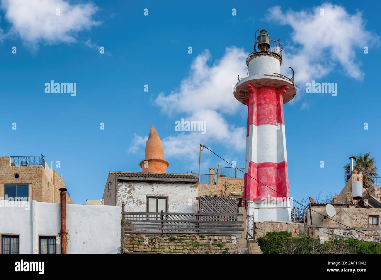 Famous red white lighthouse at the old Jaffa port. Tel Aviv, Israel Stock Photo