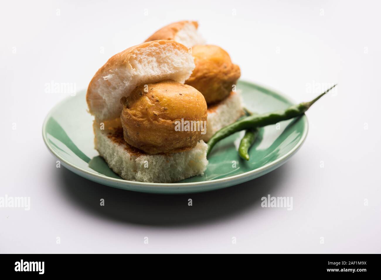 Egg Vada Pav or Anda  Wada Paav / Pao is a non-Vegetarian Fast Food Dish From Maharashtra, India Stock Photo