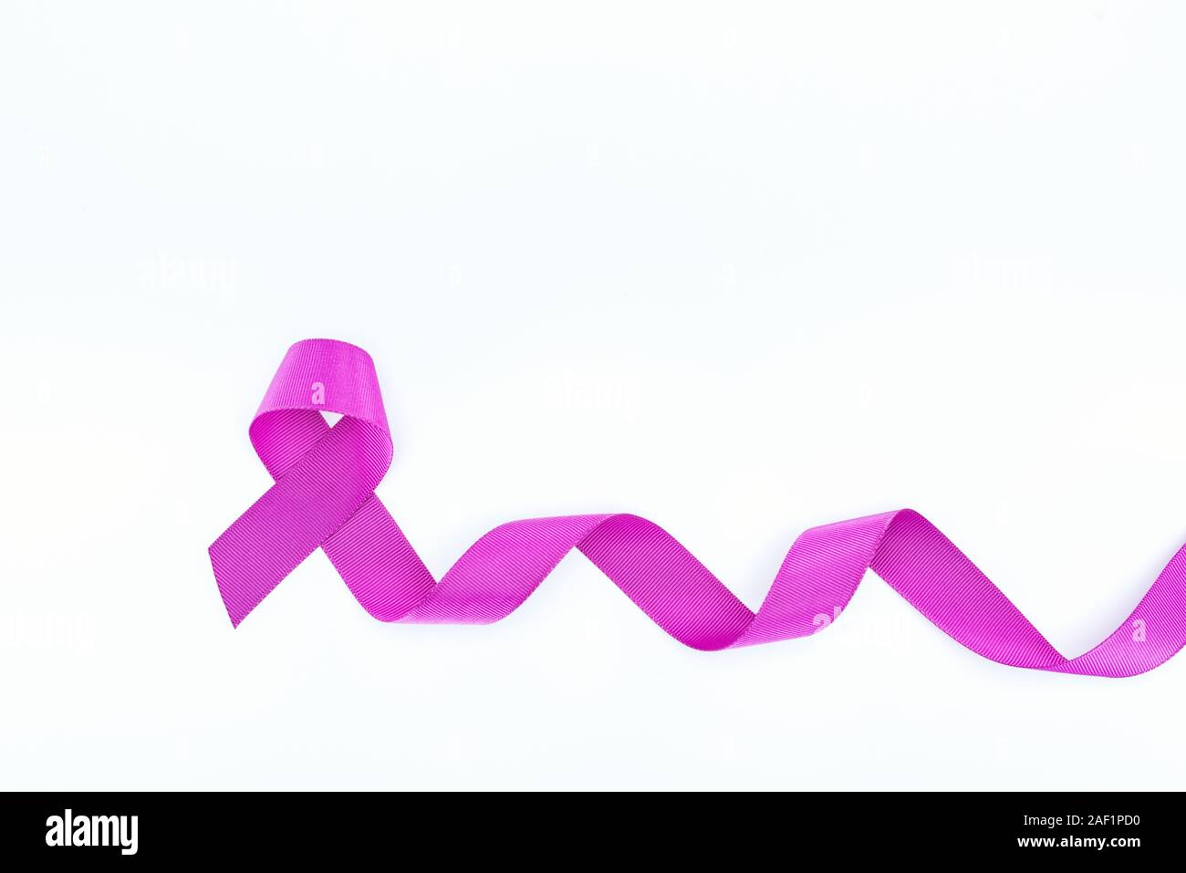 top view of long purple ribbon isolated on white Stock Photo - Alamy