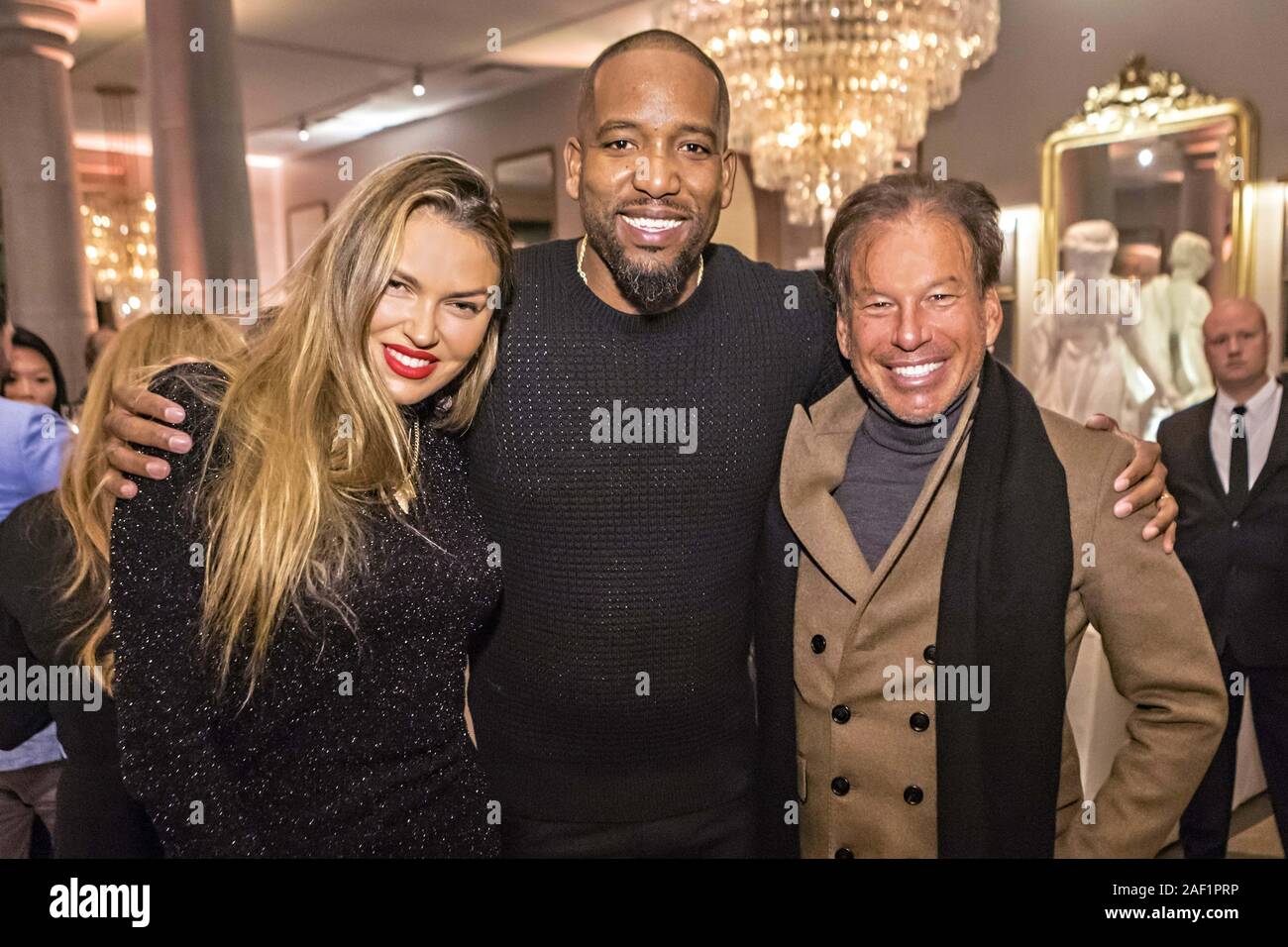 Columbus, Ohio, USA. 11th Dec, 2019. GARY FRIEDMAN, right, Chairman and Chief Executive Officer of RH, Restoration Hardware with BELLA HUNTER, left, and MICHAEL REDD, center, at the grand opening celebration of RH Columbus, The Gallery at Easton Town Center in Columbus, Ohio on Wednesday, December 11, 2019. The Gallery is a 60,000 square-foot, three-level estate that is the centerpiece of a 16-acre expansion at Easton Town Center and is the first-of-its-kind in Ohio. Easton is operated by Steiner & Associates and The Georgetown Company. Credit: James D. DeCamp/ZUMA Wire/Alamy Live News Stock Photo