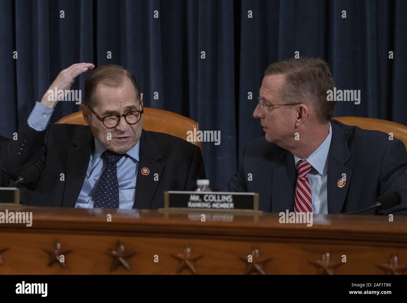 December 11, 2019, Washington, District of Columbia, USA: United States Representative Jerrold Nadler (Democrat of New York), Chairman, US House Judiciary Committee, left, and US Representative Doug Collins (Republican of Georgia), Ranking Member, US House Judiciary Committee, right, confer prior to hearing opening statements as the US House Committee on the Judiciary begins its markup of House Resolution 755, Articles of Impeachment Against President Donald J. Trump, in the Longworth House Office Building in Washington, DC on Wednesday, December 11, 2019 (Credit Image: © Ron Sachs/CNP via ZU Stock Photo