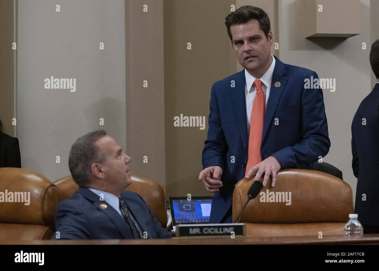 Washington, District of Columbia, USA. 11th Dec, 2019. United States Representative David Cicilline (Democrat of Rhode Island), left, and US Representative Matt Gaetz (Republican of Florida), right, confer prior to hearing opening statements as the US House Committee on the Judiciary begins its markup of House Resolution 755, Articles of Impeachment Against President Donald J. Trump, in the Longworth House Office Building in Washington, DC on Wednesday, December 11, 2019 Credit: Ron Sachs/CNP/ZUMA Wire/Alamy Live News Stock Photo